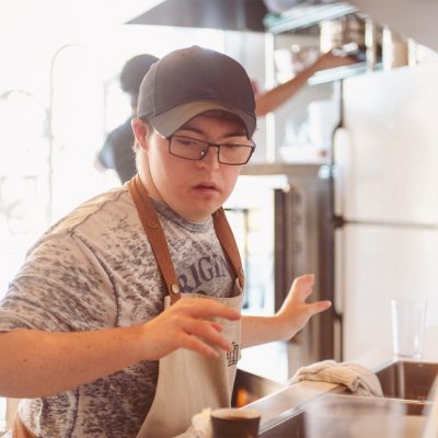 Young man working in a kitchen